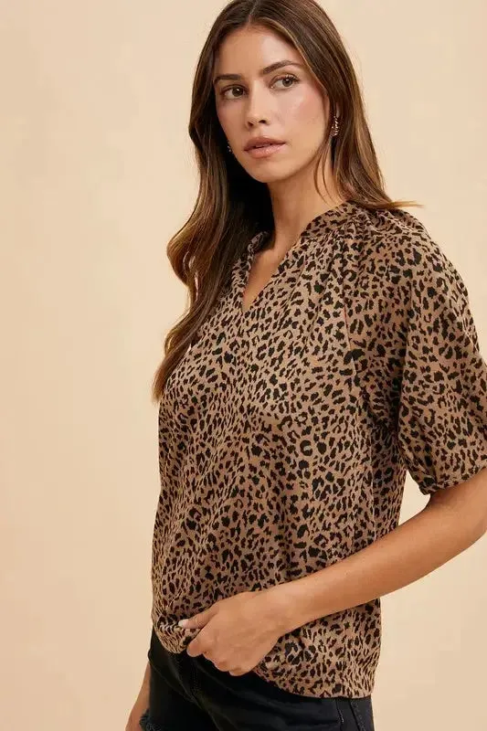 Animal Print Knit Volume Sleeve Blouse – Trendy Statement Piece with Buttoned Detail