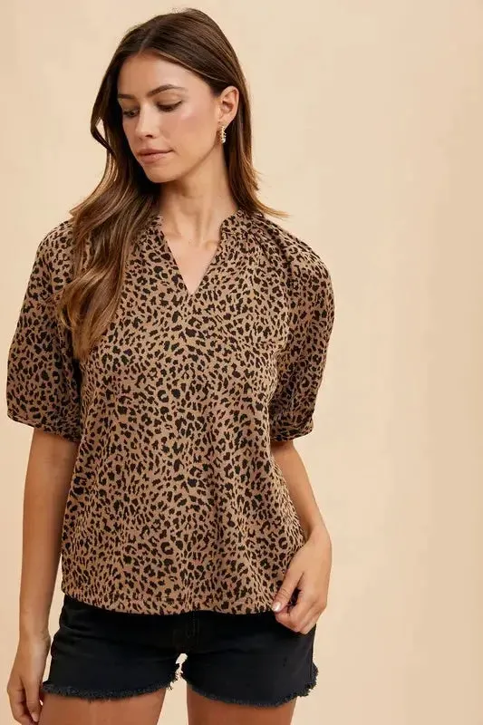 Animal Print Knit Volume Sleeve Blouse – Trendy Statement Piece with Buttoned Detail