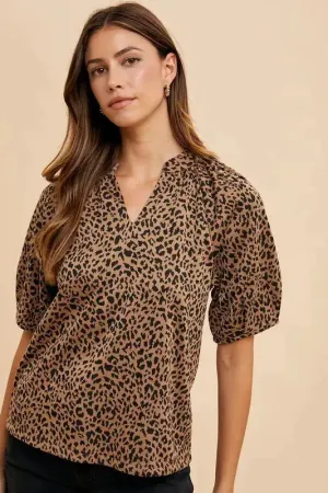 Animal Print Knit Volume Sleeve Blouse – Trendy Statement Piece with Buttoned Detail