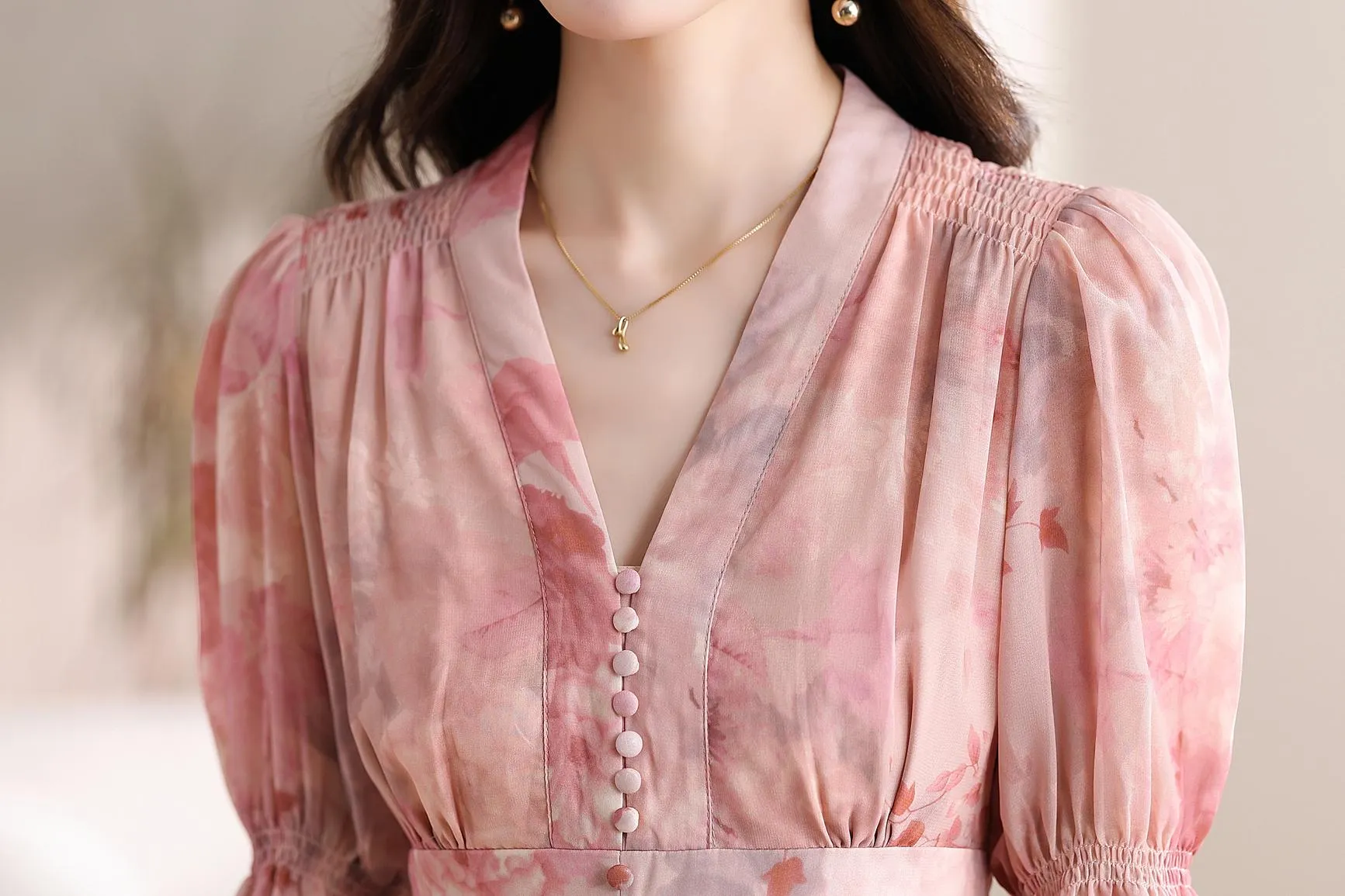 Women's Button-Up Tea Tea Dress Featuring a V-Neck and Floral Design