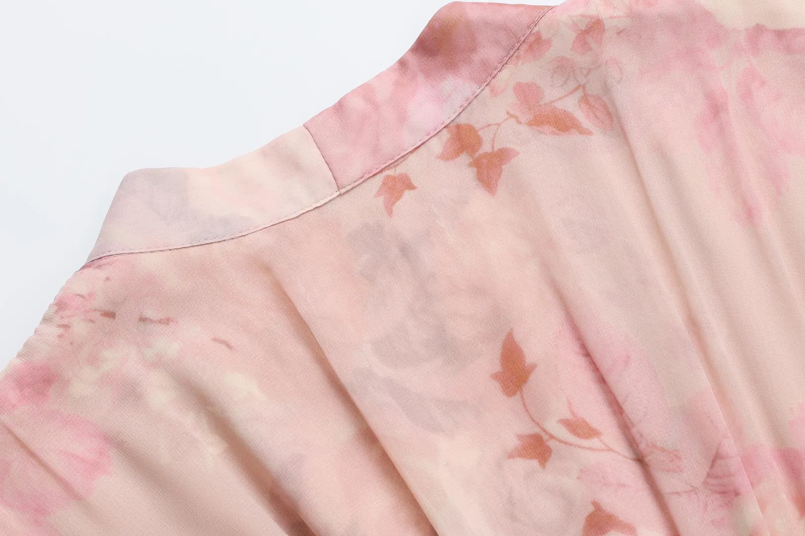 Women's Button-Up Tea Tea Dress Featuring a V-Neck and Floral Design